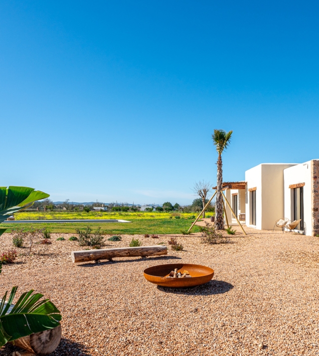 Resa Estates Ibiza te koop for sale finca modern exterior grass.jpg